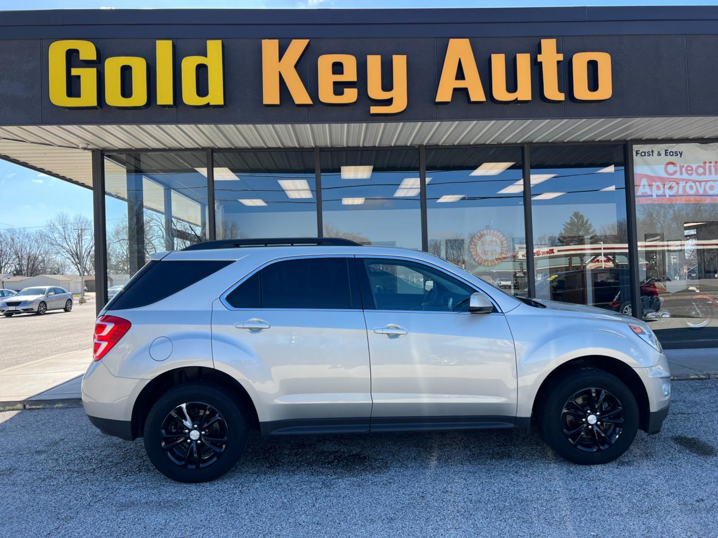 2016 Champagne Silver Met Chevrolet Equinox LT 2WD (2GNALCEK3G1) with an 2.4L L4 DOHC 16V FFV engine, 6-Speed Automatic transmission, located at 1633 W Kimberly, Davenport, IA, 52806, (563) 323-5341, 41.559456, -90.598732 - Photo#0